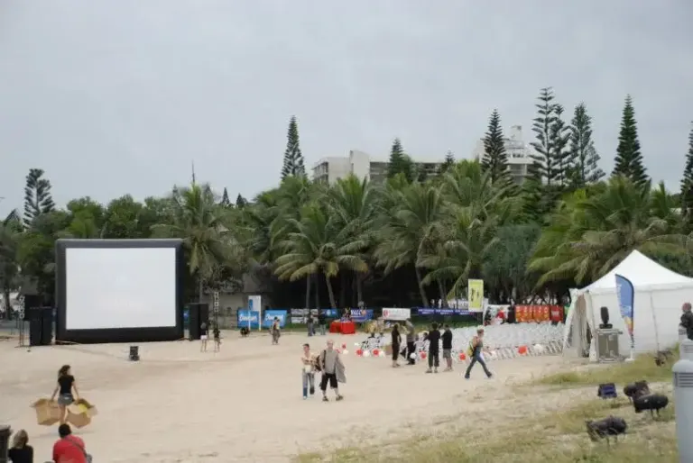 Hallucine inflatable movie screen set up on the beach in New Caledonia