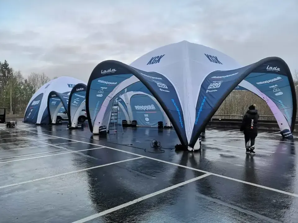X-shaped inflatable event tent