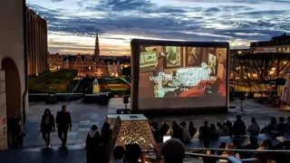 Giant inflatable movie screen set up right in the heart of downtown Paris